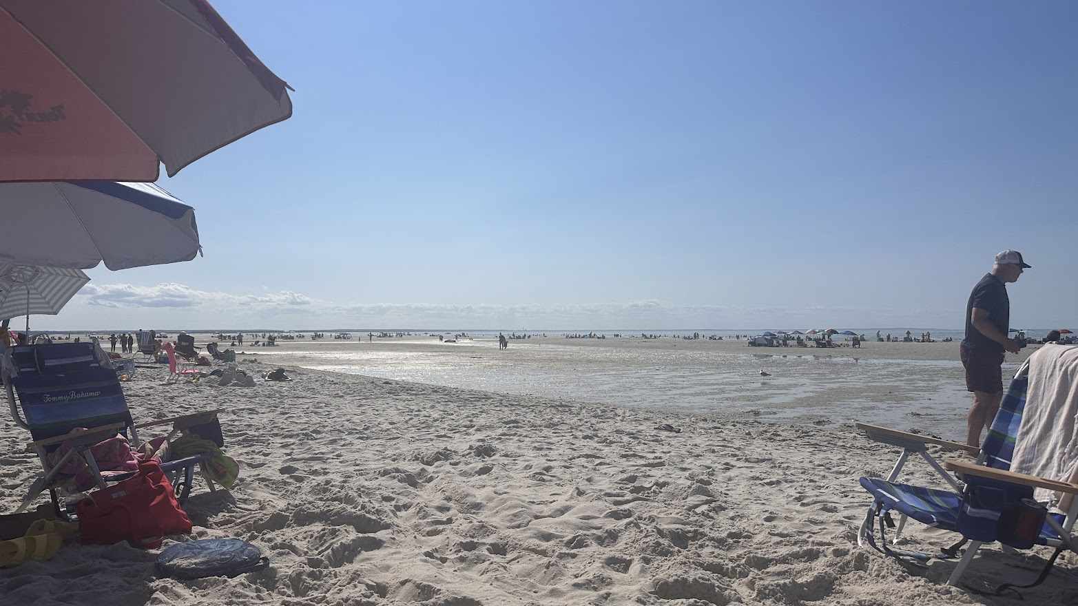 A view across the sand and shore of Mayflower Beach