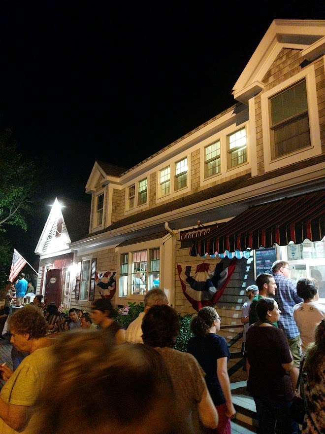 Crowd of people waiting for ice cream